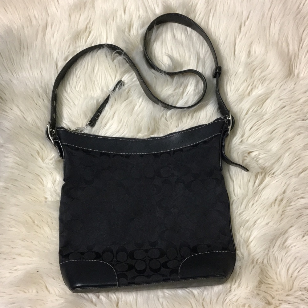 Coach black signature print purse leather bottom